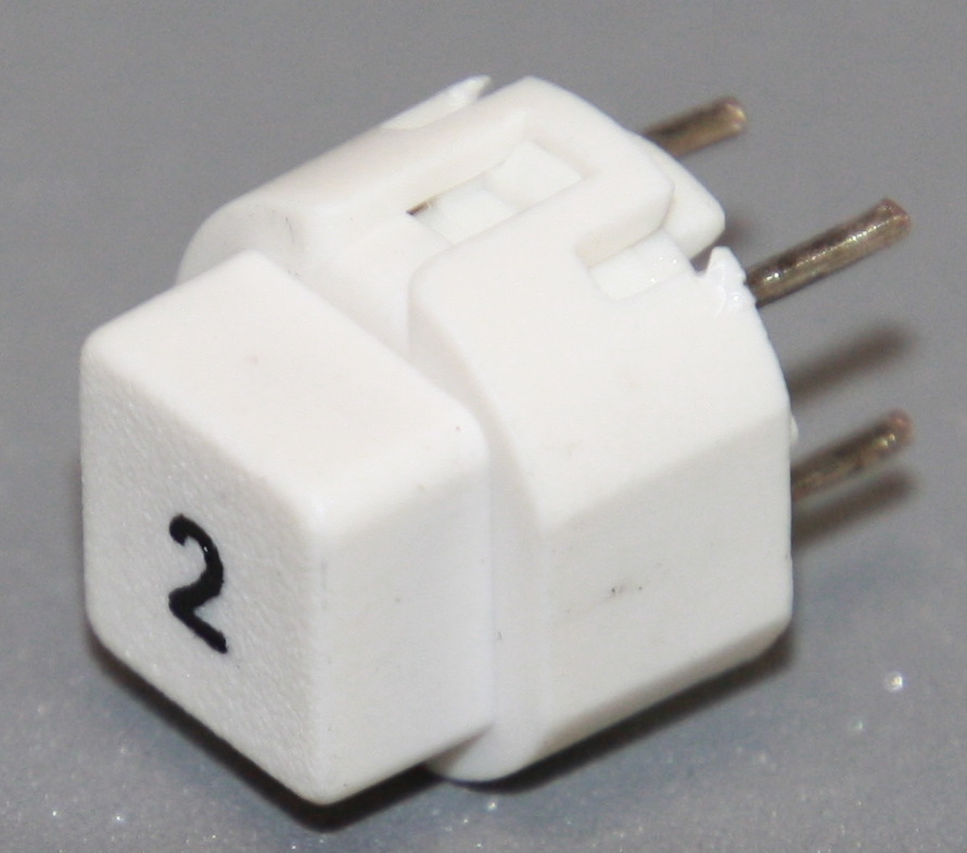Tryktast med påskrift "2"